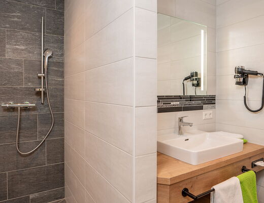 Sink and shower in apartment B