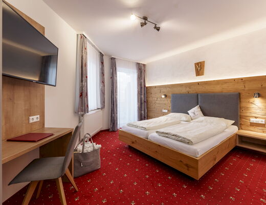 Gemütliches Familienzimmer im 4 Sterne Hotel Moser in Rohrmoos Schladming