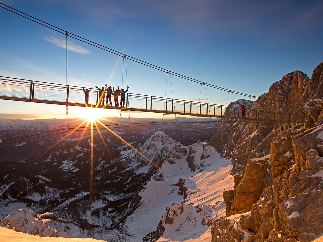 The suspension bridge with a deep view on the Dachstein